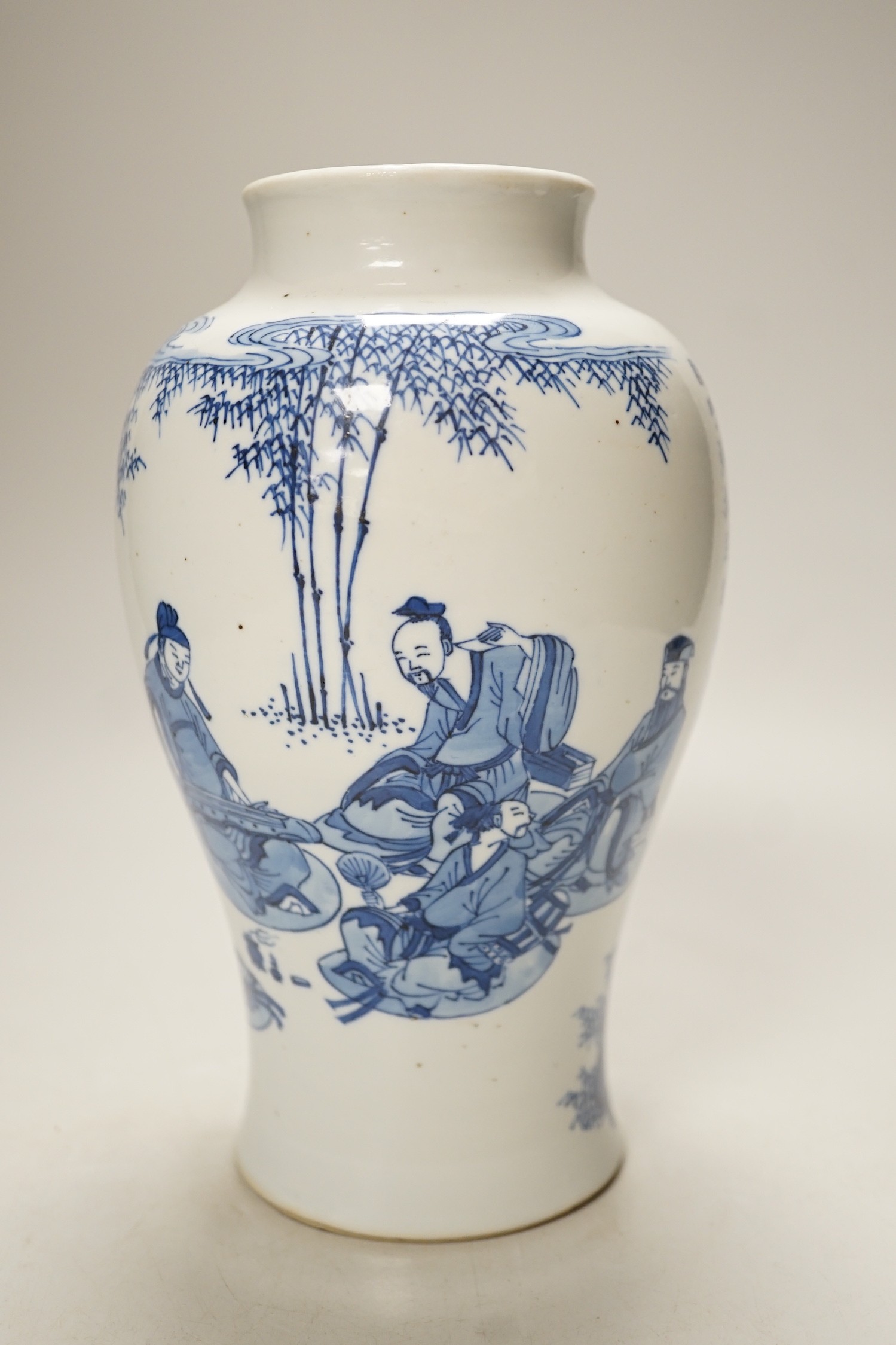 A Chinese blue and white inscribed baluster vase, 20cm tall